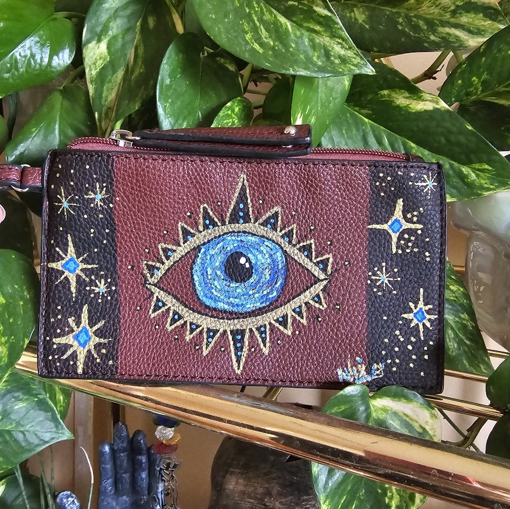 Custom painted evil eye wristlet